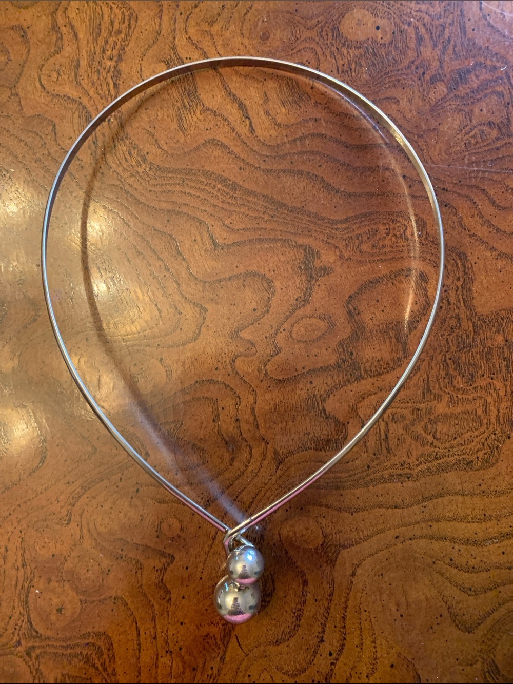 Gorgeous minimalist necklace: V shape with interlocking balls